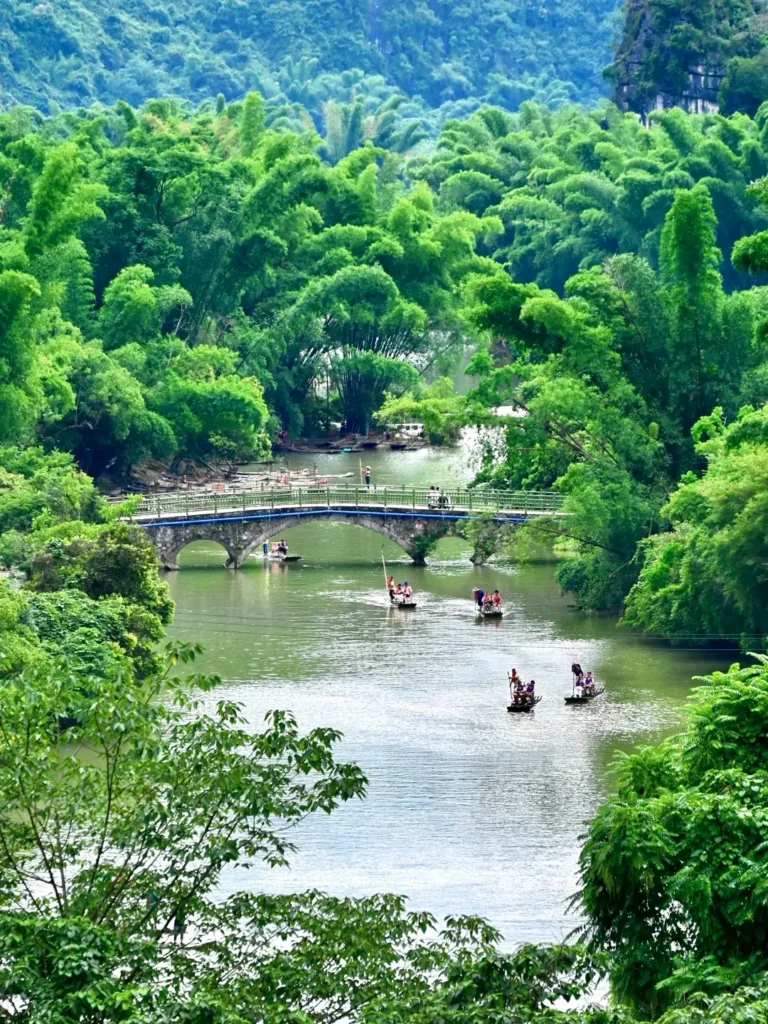 Guilin travel guide
Guilin itinerary
Yangshuo
Li River
Longji Rice Terraces
China travel
Yulong River
Experiencing a tranquil bamboo raft ride during your comprehensive Guilin travel guide adventure.