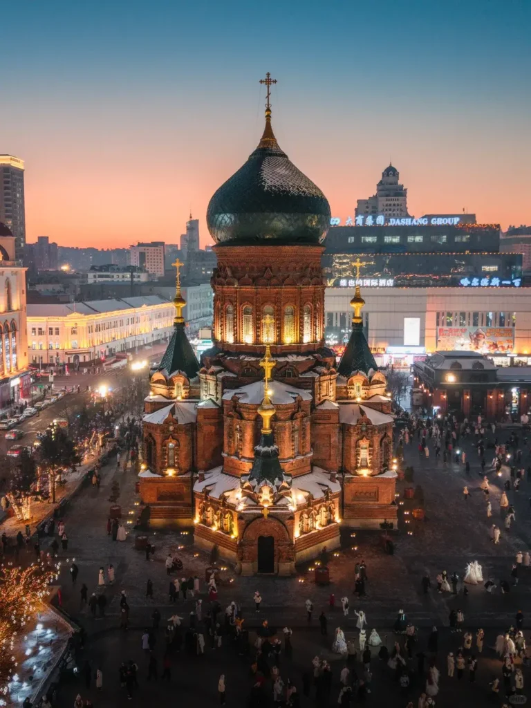 The historic St. Sophia Cathedral standing elegantly under a heavy snowstorm, a premier cultural destination included in our Harbin travel guide.
Harbin 7-day itinerary
Things to do in Harbin
Harbin travel guide
Harbin Ice and Snow World
Central Street
St. Sophia Cathedral
Sun Island