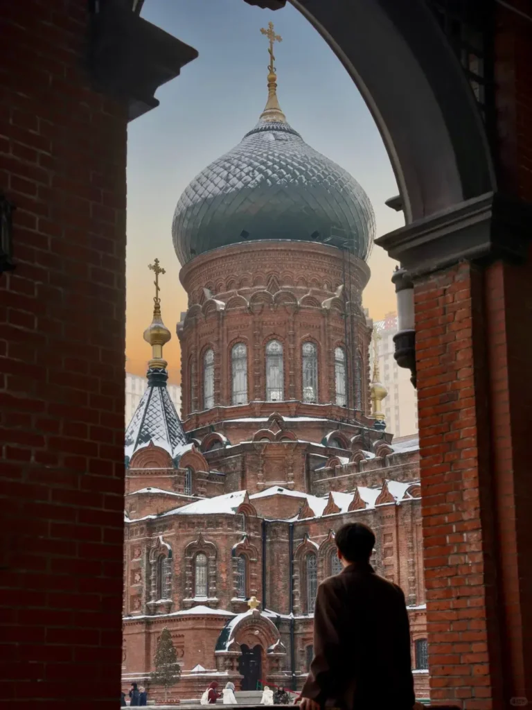 The historic St. Sophia Cathedral standing elegantly under a heavy snowstorm, a premier cultural destination included in our Harbin travel guide.
Harbin 7-day itinerary
Things to do in Harbin
Harbin travel guide
Harbin Ice and Snow World
Central Street
St. Sophia Cathedral
Sun Island