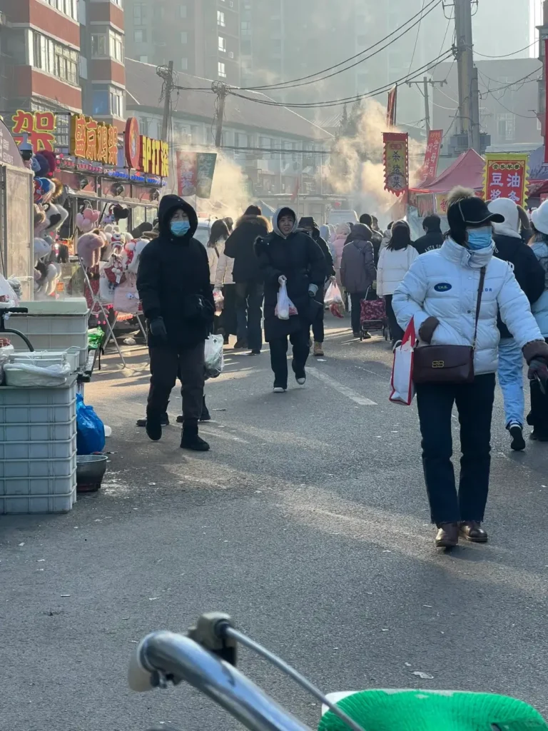Wander the bustling winter markets to add vibrant color to your Songyuan travel guide experience.