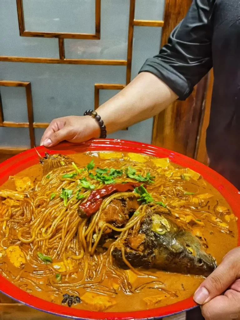 Stewed Amur River Carp (Tieguo Dun Yu)