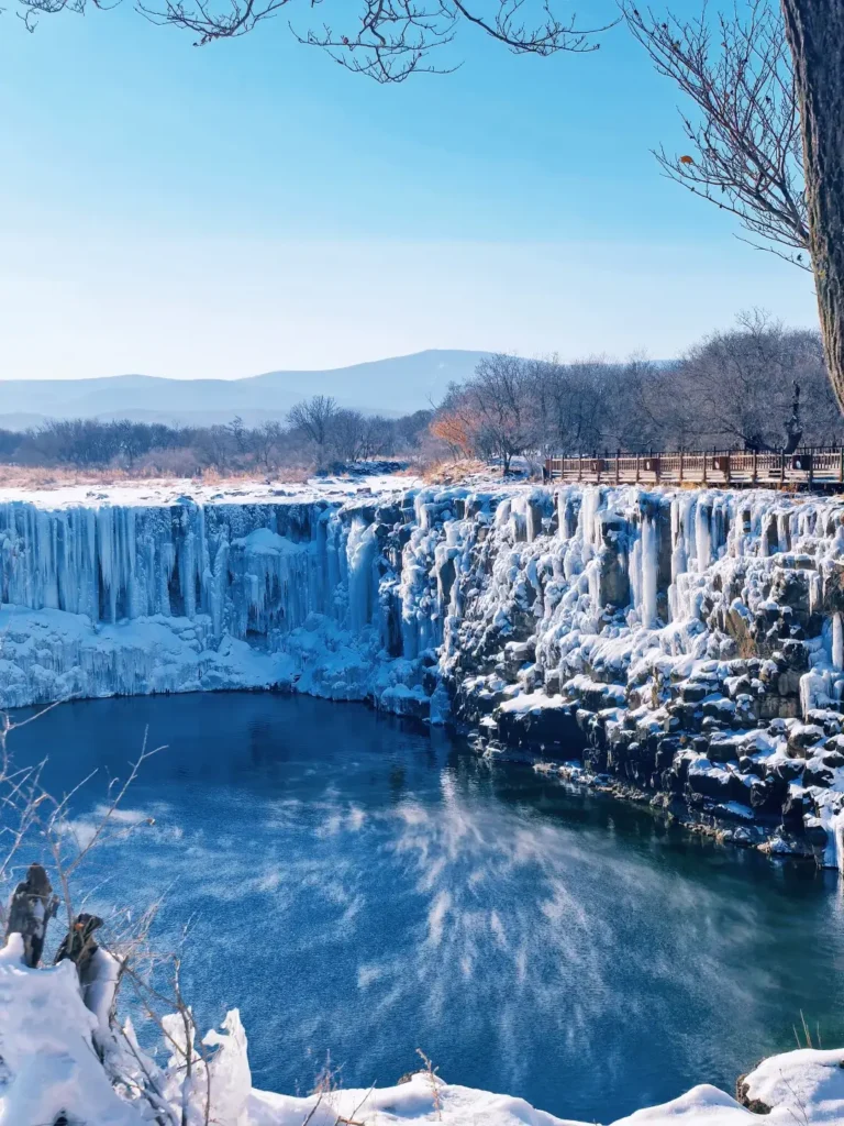 The breathtaking frozen Diaoshuilou Waterfall, a massive wall of blue ice and a premier natural destination included in our Mudanjiang travel guide.
Mudanjiang travel guide
Things to do in Mudanjiang
Mudanjiang itinerary
Jingpo Lake
China Snow Town
Siberian Tiger Park
